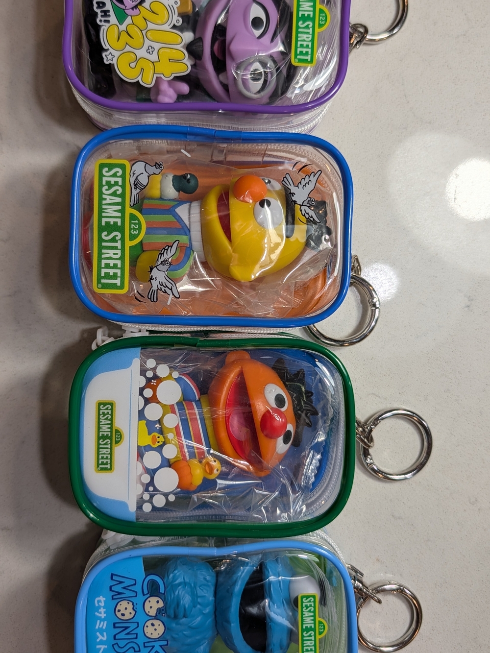 Sesame Street Keychain Set with Yellow Rubber Duck and Orange Ernie Figure